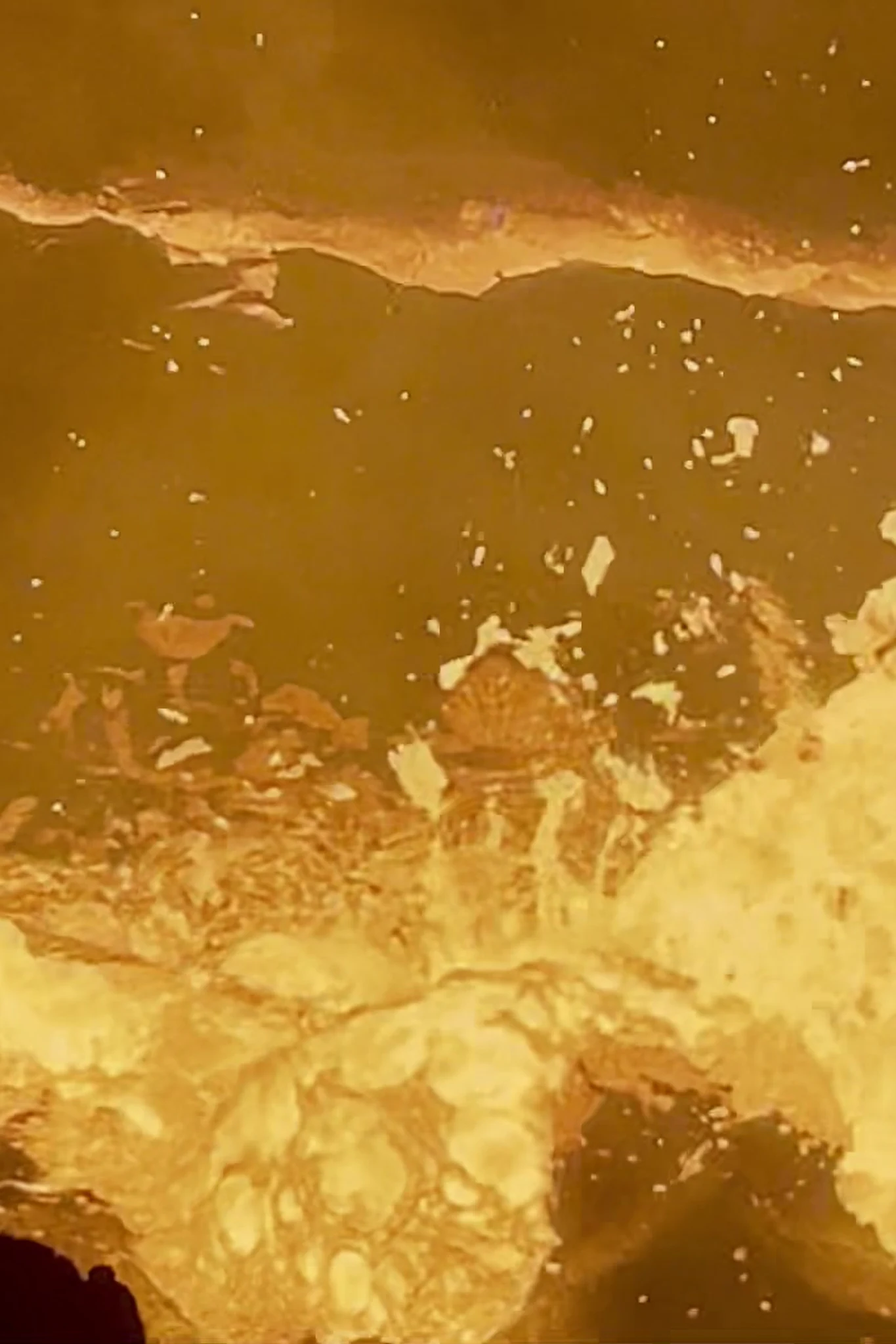 A video still showing the moving molten surface at Erta Ale.