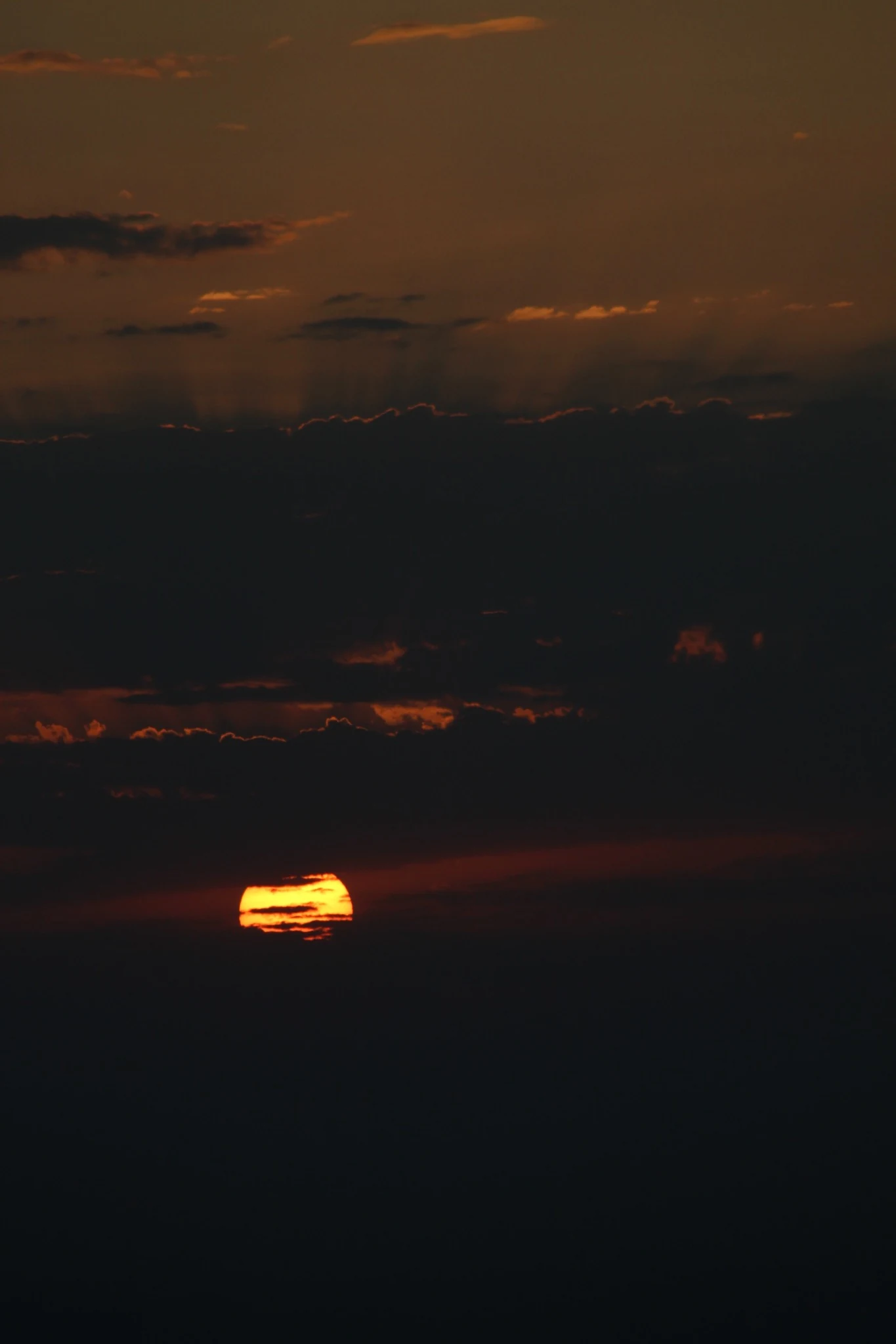 Low morning light emerging above the Afar horizon.